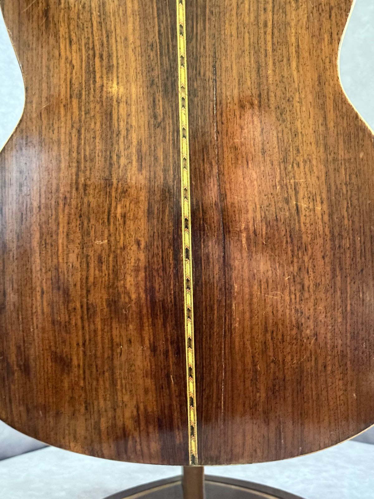 Close-up of back center seam purfling in black, red, and gold